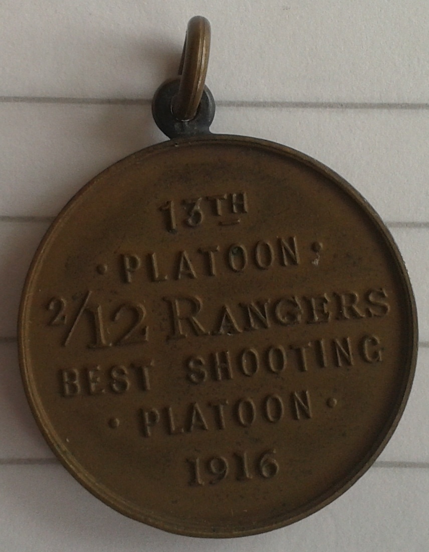 Serjeant Cecil L Owen's shooting badge reverse