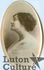 A locket shaped photograph of a woman